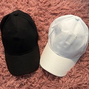 Set of black and white minimalist baseball caps